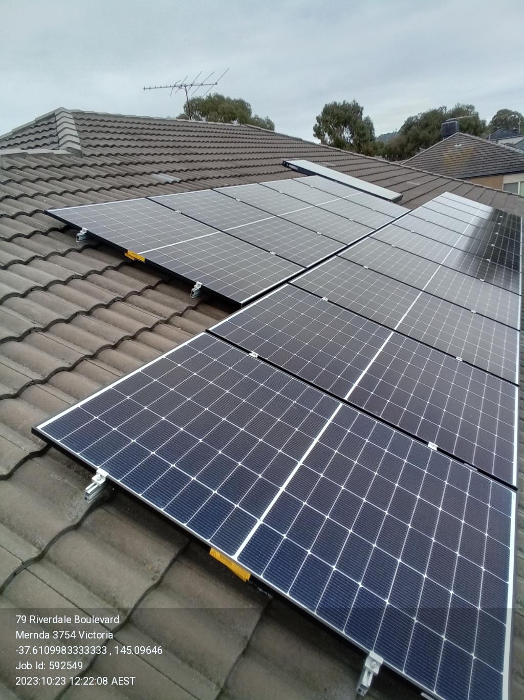 Solar panel installation on a tiled roof