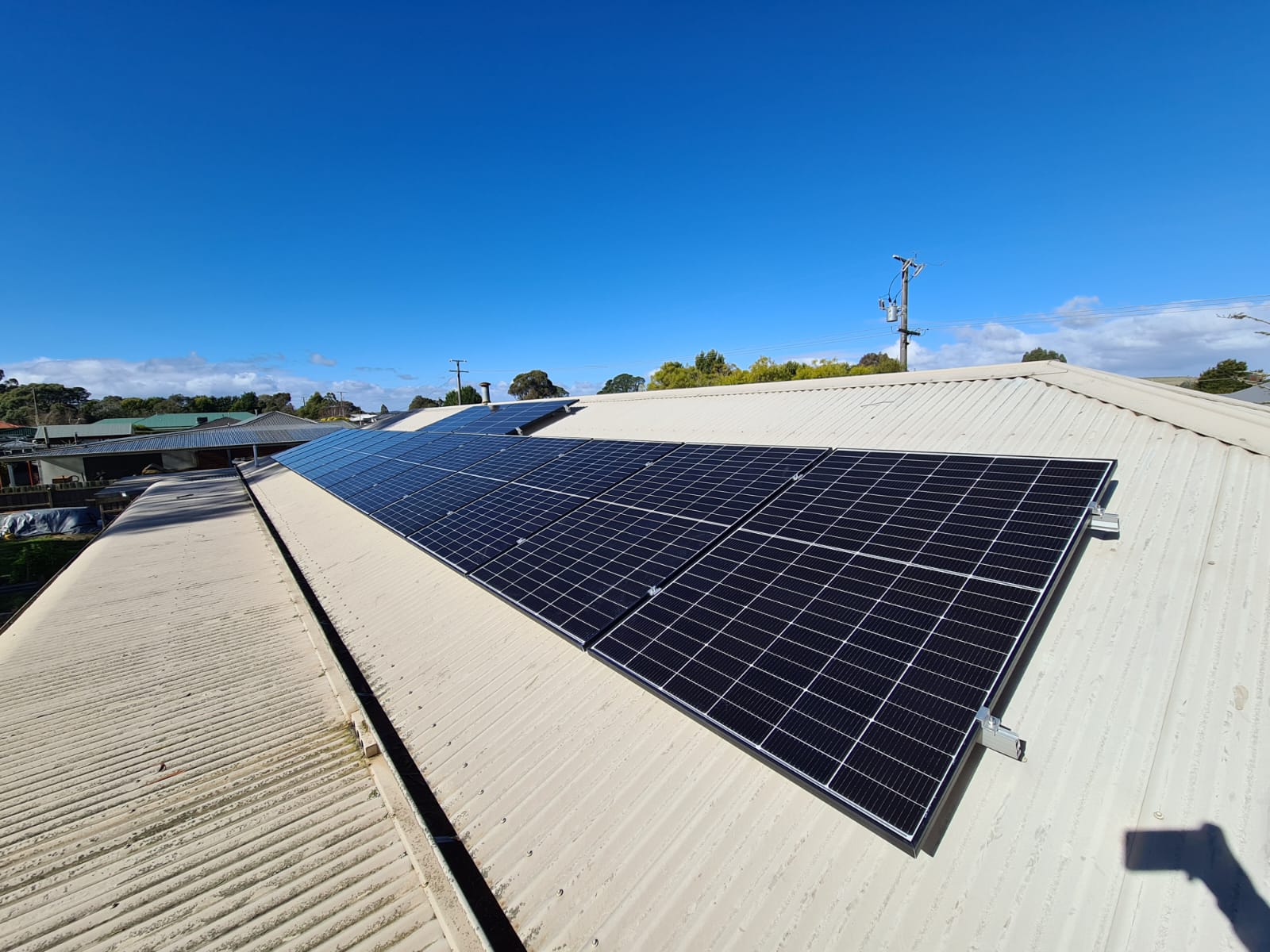 Solar panels installed across a tiled roof